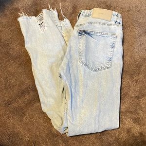 Pair of boyfriend jeans with holes, color light blue, size 26